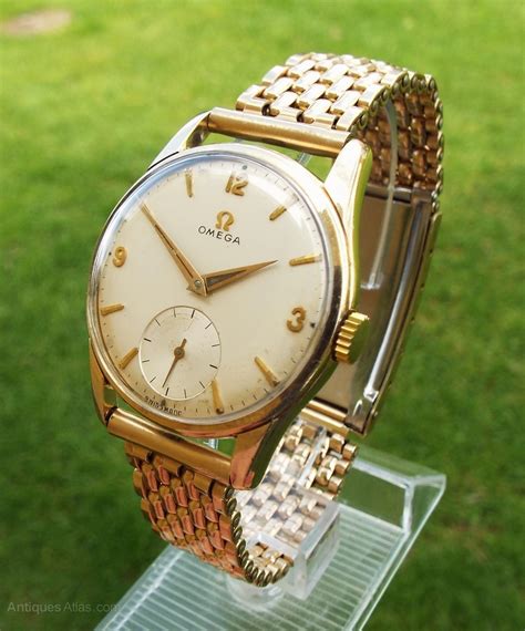 gold omega watch 1960's